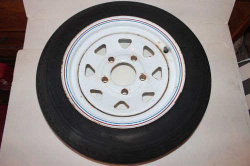 4.80 x 12  2 plies sure trail st trailer tire on 12"  5 lug spoke wheel 4.80x12