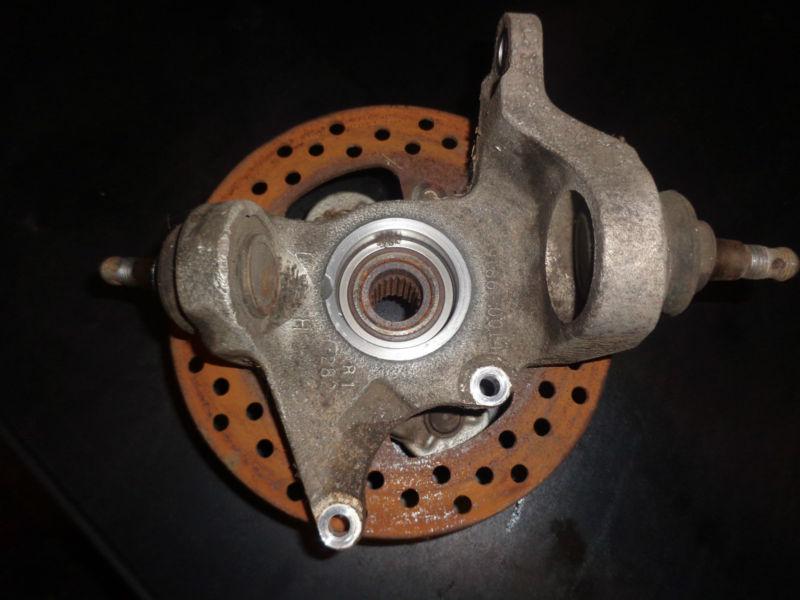 05 06 kawasaki brute force 750 kvf 750i front lh hub steering knuckle brake disc