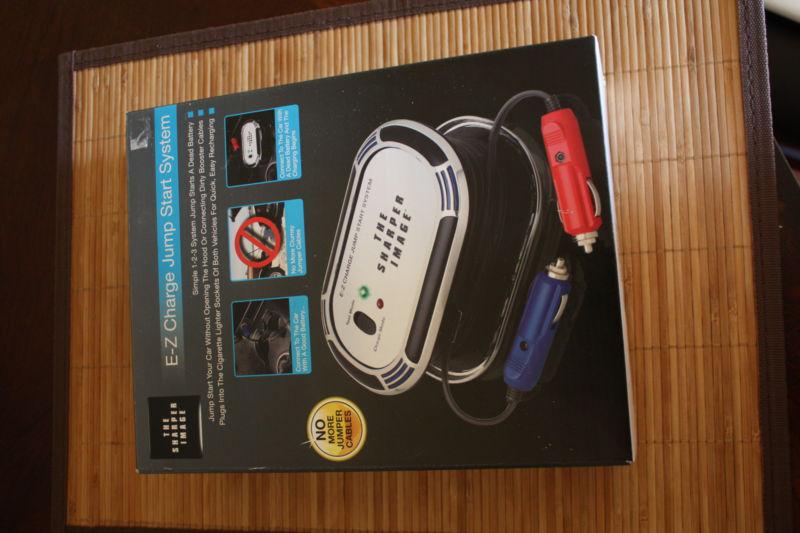 The sharper image e-z charge jump start system brand new
