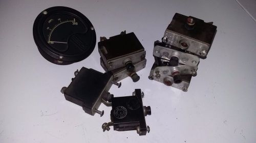 8 old aircraft circuit breaker with an ammeter