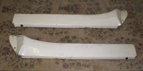 Volvo 122 amazon- 2-interior metal door trims with window scrapers.