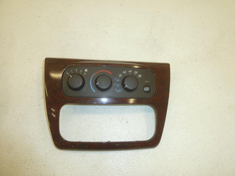 02-05 sebring stratus 4 door sedan climate control w/ dash bezel trim 04596277aa