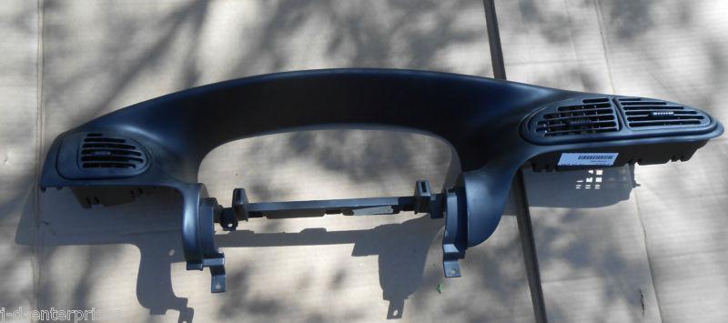 1996 - 2000 dodge caravan dash cluster bezel  (black)          used