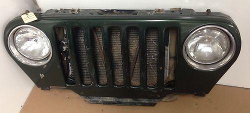 Jeep tj wrangler oem grill radiator support complete assembly 97-06 lights