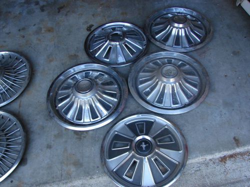 Five 1965-1966 mercury mustang  ford 14 inch hubcaps