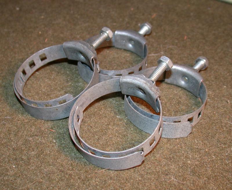 Ford edsel   4 original "rotunda"  tower radiator hose clamps vintage nos 