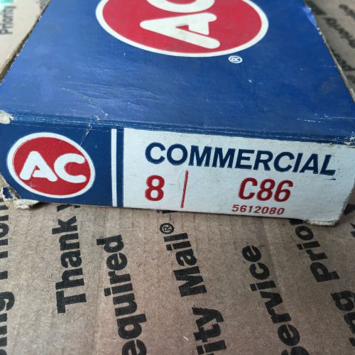 Vintage ac c86 commercial spark plug setof 8. four green rings, nos