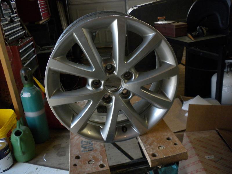 2011 volkswagen jetta  aluminum wheel o.e.m.