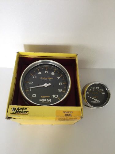 Auto meter 4898 carbon fiber 5" tach in-dash electronic + 4891 2-5/8" voltmeter