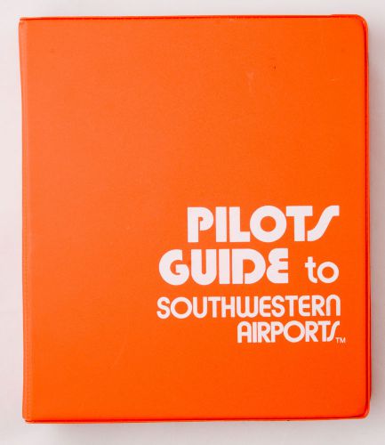 Pilots guide to southwestern airport  orange binder for airplane pilot aviation