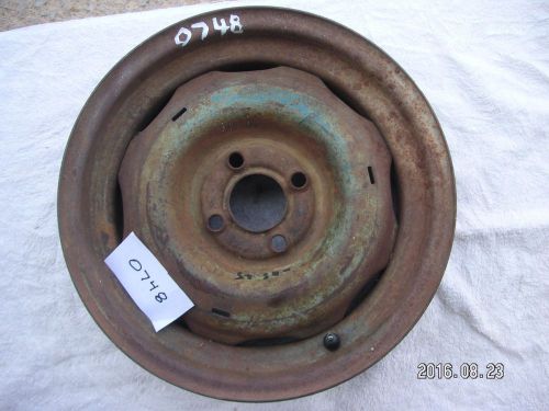 Studebaker wheel  15 inches by 5 inches.  4 on 4 inch pattern.  my#0748pr