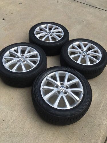 Set of vw jetta 2012 wheels with tires used  still have tred