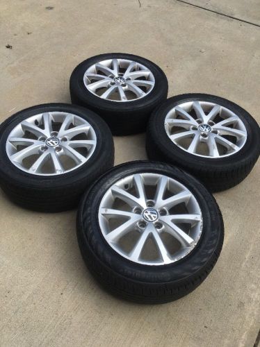 Set of vw jetta 2012 wheels with tires used  still have tred