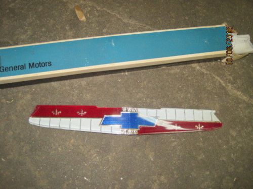 1957 chevrolet nos grille bar emblem