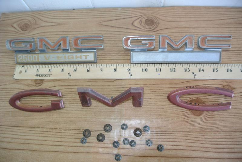 Old gmc  2500 v-eight- fender & front emblems-w/ pins and original nuts-