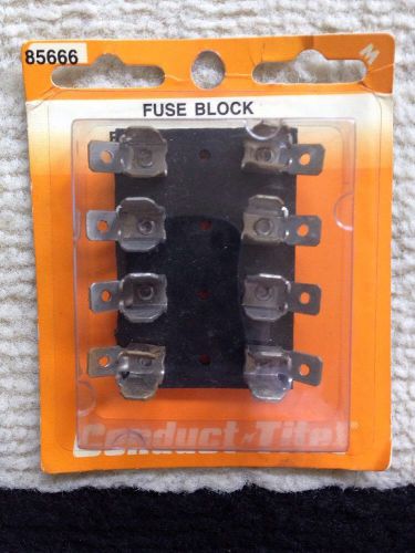 Fuse block: holds 4 glass fuses - dorman# 85666