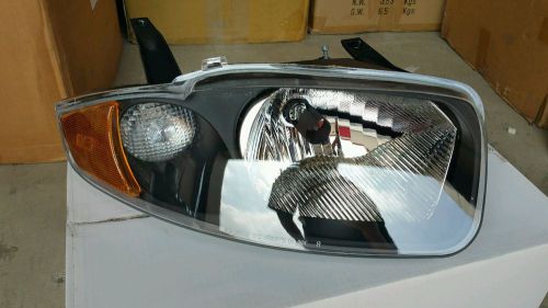2003-2005 chevy cavalier crystal black headlight (right side only)