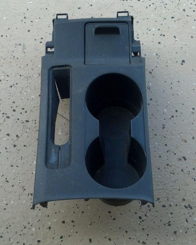 05-10 scion tc cup holder e-brake bezel oem