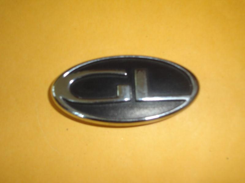 Oldsmobile intrigue gl chrome black emblem