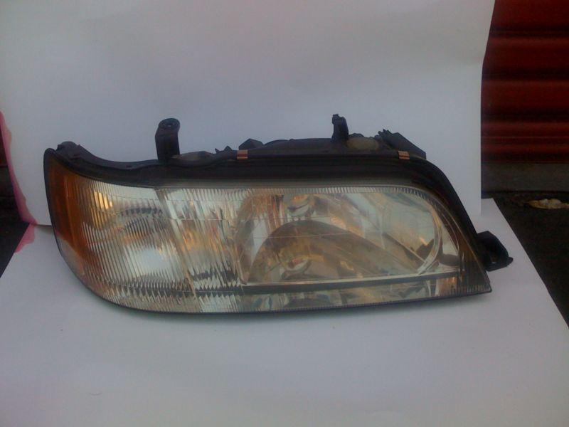1997-2001 infiniti q45 headlamp halogen pasanger side oem