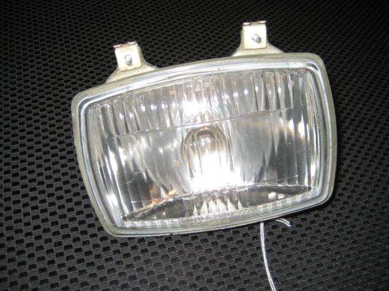 Yamaha 225 dx headlight assembly
