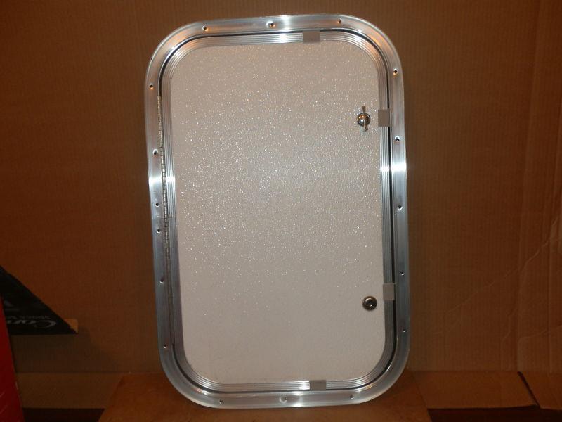 Rv cargo door r.o. 22" tall x 14" wide x 3/4" thick rough white ( used )