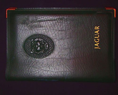 Owners manuals in leather folio,  jaguar xj6 1985-1986