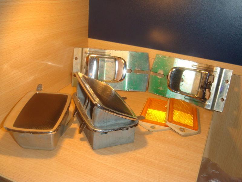 Saab 99 year 1974 inner door handles,back seat ashtrays and side markers!!