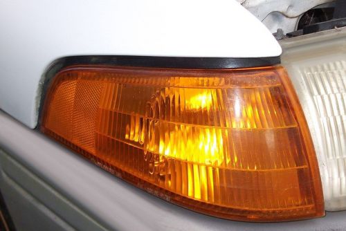 1992 ford escort front passenger side turn signal cover outer headlight assembly