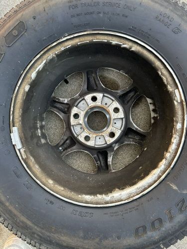 Ranger trail cool hub 14” aluminum boat trailer wheels and tires.