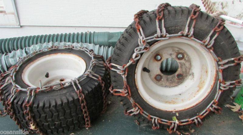 16 x 6.5 - 9 rims and tires with chains from snow blower 2 3/4 bolt spacing