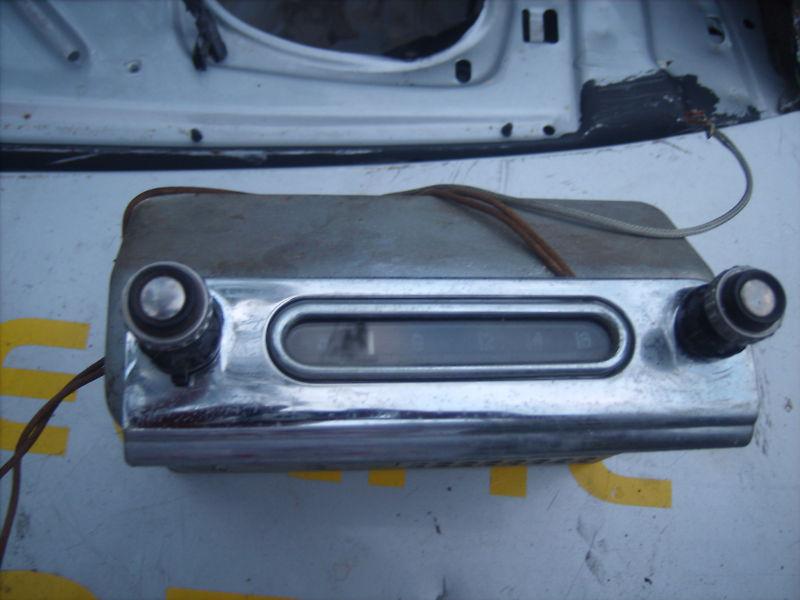 53  chevy radio  chrome faceplate,knobs 