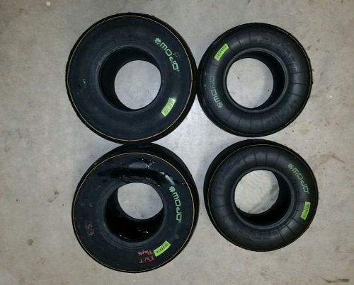 A set of used mojo yellows  go kart tires