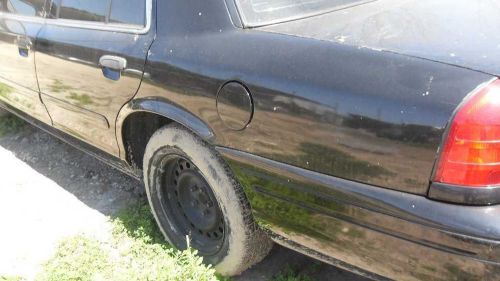 Crown vic 2001 fuel filler door 43315