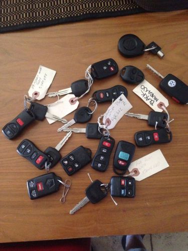 Lot of 13 key fobs keyless entry remotes kia nissan,ford,chrayler,jaguar,infinit