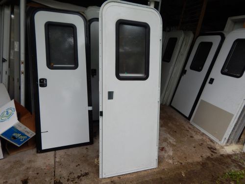 Trailer door, 26" x 72".  with screen door, frame, locks &amp; keys, new door #37