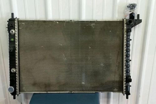 Radiator, for 2010 gmc acadia, used....****low shipping cost****