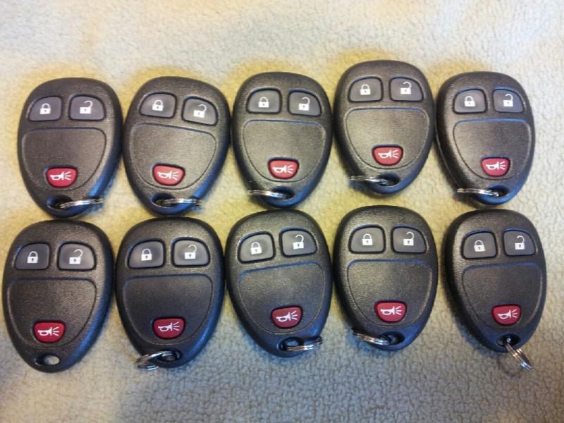 Lot of 10 gm new remote key keyless fob 15777636