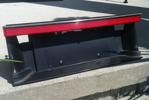 87 88 89 90 91 92 allante center license plate  light with lens