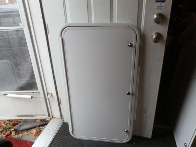 Rv cargo door r.o. 42" tall x 22" wide x 1 1/4" thick ( used )