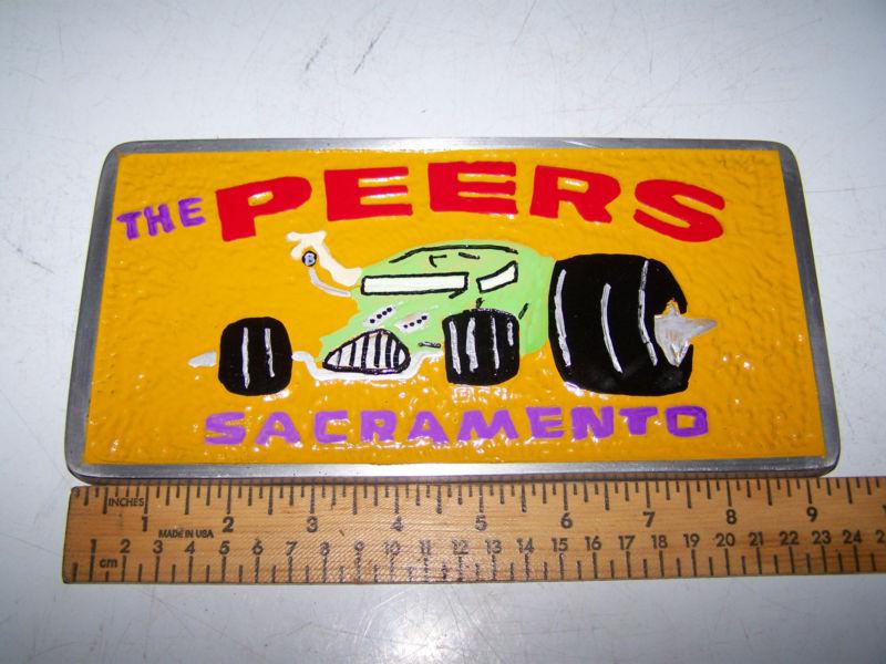The peers  sacramento  car club plaque