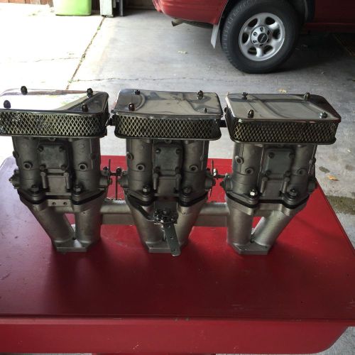 Triple weber carburetor system set up for triumph tr6
