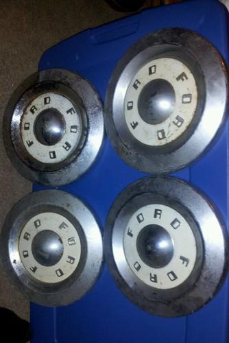 Complete set of  4 1950s ford hubcaps 
