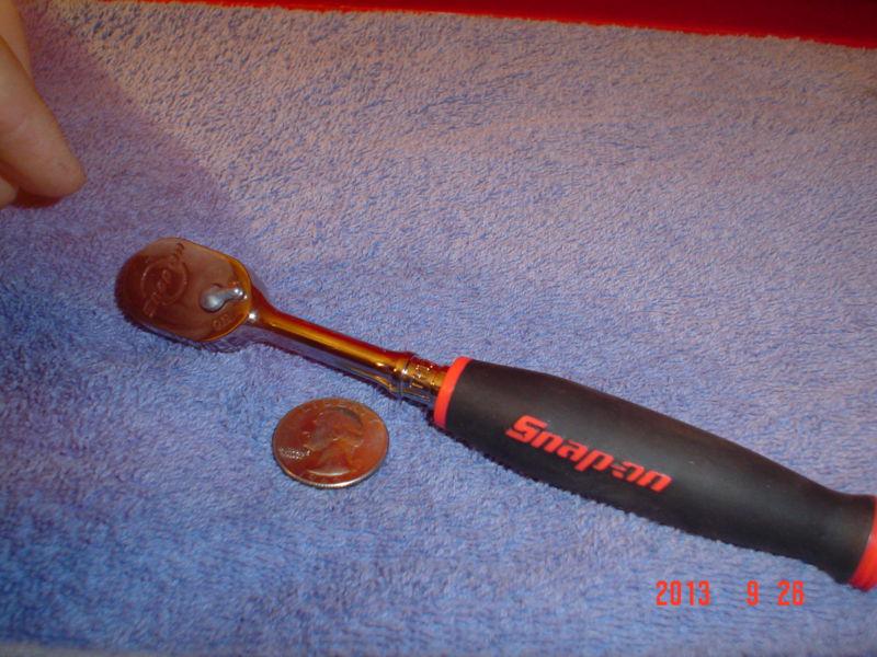  snap on 1/4 dr ratchet, sealed head (high strength) long soft grip rd/blk hndl