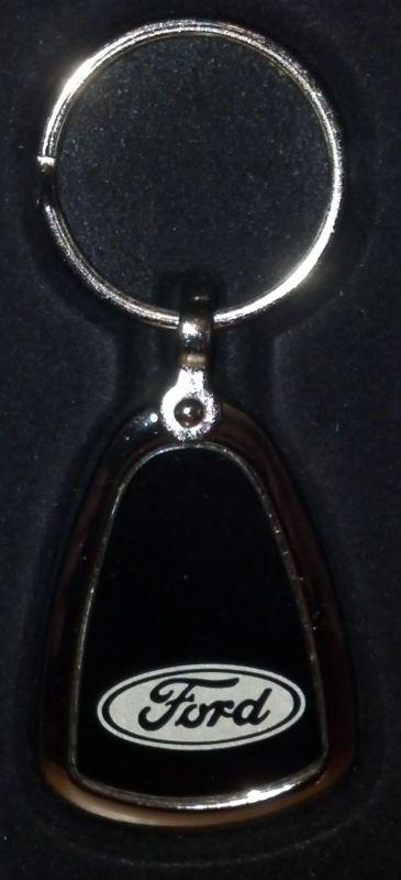 Ford tear drop black inlay encased in silver color metal keychain