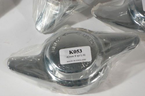 /.mg mgb/gt eared knock on wire wheel spinners 8ti set of 4.1965-1980 brand new.