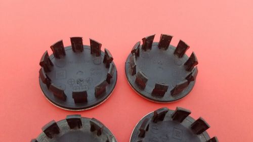 Chevrolet trax spark sonic bolt cobalt cruze 4 wheel hub cap center set oem c16