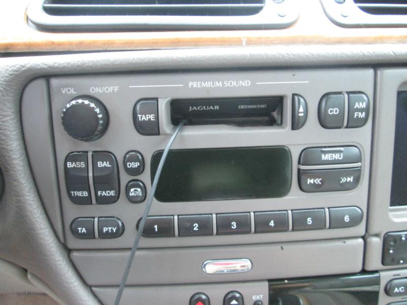 2000 jaguar s-type radio console  unit with navigation am/fm cassette and cd 