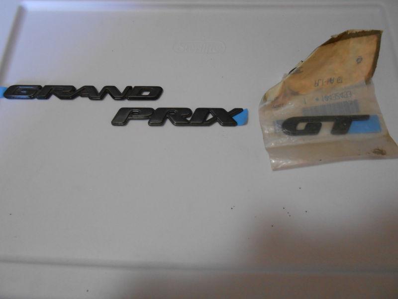 1999,99,00,01,02,03 pontiac grand prix gt door emblem new oem