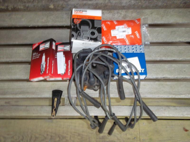 Find JAGUAR XJS V12CHAMPION PLUGSCALIPER REBUILD KITSOIL FILTERLUCAS CAP & ROTOR in